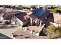 Beautiful view of a single-story home with solar panels and a well-kept roof at 26637 S New Town Dr, Sun Lakes, AZ 85248