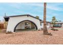 Charming single story home featuring unique arched covered parking at 4022 W Kaler Dr, Phoenix, AZ 85051