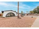 Charming single story home featuring unique arched covered parking at 4022 W Kaler Dr, Phoenix, AZ 85051