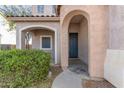 Charming entryway with an arched doorway and a cozy nook, perfect for welcoming guests at 44983 W Sage Brush Dr, Maricopa, AZ 85139