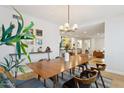 Elegant dining room showcasing stylish furniture, natural light, and an inviting atmosphere at 8709 E Mackenzie Dr, Scottsdale, AZ 85251