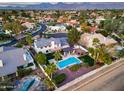 Aerial view of a home showcasing a pool, outdoor living space, and manicured landscaping at 9921 E Doubletree Ranch Rd, Scottsdale, AZ 85258