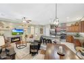 Open living space combining kitchen, dining, and living areas for seamless entertaining at 20462 N Ridgewood Ln, Surprise, AZ 85374