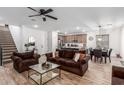 Open-concept living space flowing into kitchen and dining areas, perfect for entertaining at 2067 N Marketside Ave, Buckeye, AZ 85396