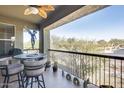 Comfortable outdoor patio with an angel statue and neighborhood views at 2425 W Bronco Butte Trl # 2008, Phoenix, AZ 85085