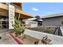 Condominium Landmark entrance featuring desert landscaping, including cacti and succulents at 4750 N Central Ave # G2, Phoenix, AZ 85012