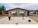 Sweet single story home with simple landscaping and a front facade that features two louvered windows at 17258 N 66Th Dr, Glendale, AZ 85308