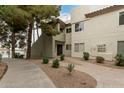 Neutral exterior with stairs, landscaping, and walkway create a welcoming outdoor space at 1825 W Ray Rd # 2116, Chandler, AZ 85224