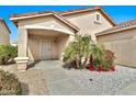 Inviting front porch with desert landscaping leading to the front door at 2210 E Caspian Way, San Tan Valley, AZ 85140