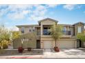 Charming two-story home with a balcony, two car garage, and desert landscaping at 5100 E Rancho Paloma Dr # 2024, Cave Creek, AZ 85331