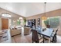 Bright living area with view of the dining room and backyard at 14447 N 100Th Way, Scottsdale, AZ 85260