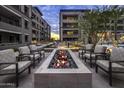 Outdoor fire pit with seating area and views of the modern building at 5250 E Deer Valley Dr # 344, Phoenix, AZ 85054