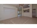 The living room features tile flooring and an abundance of natural light at 655 W Mission Dr, Chandler, AZ 85225