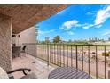 Relaxing balcony featuring comfortable seating with scenic views of the golf course and surrounding greenery at 7428 N Via Camello Del Norte -- # 182, Scottsdale, AZ 85258