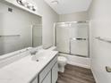 Well-lit bathroom with a shower-tub combo, ample counter space, and modern fixtures at 11609 N 30Th Ln, Phoenix, AZ 85029