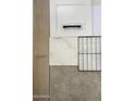 Close up on design center selections including granite counter, white shaker cabinets, and wood flooring at 18364 W Navajo St, Goodyear, AZ 85338