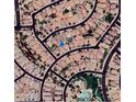 An aerial view of the house with nearby amenities including a private park at 2486 E Espada Trl, Casa Grande, AZ 85194