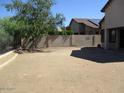 Spacious backyard with block wall fence and plenty of room for customization and landscaping at 32020 N 23Rd Ave, Phoenix, AZ 85085