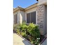 Inviting home exterior featuring desert landscaping and a brick-accented facade at 6887 S Teresa Dr, Chandler, AZ 85249