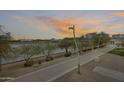 Scenic walking path along Tempe Town Lake with views of desert trees and the city skyline at 945 E Playa Del Norte Dr # 1012, Tempe, AZ 85288