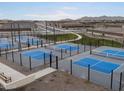 Community pickleball courts offering a fun and active lifestyle with mountain views at 36986 W Prado St, Maricopa, AZ 85138
