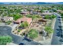 An aerial view of the desert home showcasing its location in a quiet neighborhood at 4116 E Sierra Sunset Trl, Cave Creek, AZ 85331