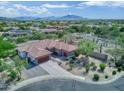 Expansive aerial view of the home showcasing its desert landscaping and mountain views at 4116 E Sierra Sunset Trl, Cave Creek, AZ 85331