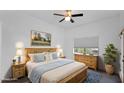 Comfortable bedroom featuring a king-size bed, ample natural light, and tasteful decor at 4533 N 22Nd St # 228, Phoenix, AZ 85016