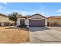 Charming single-story home featuring a two-car garage and low maintenance landscaping at 4817 E Thunderbird Dr, Chandler, AZ 85249