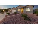 Inviting home featuring a welcoming entrance, well-manicured landscaping, and a cozy facade at 6404 W Black Hill Rd, Phoenix, AZ 85083