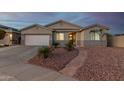 Beautiful single-Gathering home with a desert landscape and two-car garage at 6404 W Black Hill Rd, Phoenix, AZ 85083