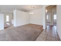 Inviting living room showcasing neutral tones, and an open-concept floorplan at 15222 N 138Th Dr, Surprise, AZ 85379