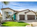 Charming single-story home with a well-manicured lawn, inviting curb appeal, and a two-car garage at 1737 E Marquette Dr, Gilbert, AZ 85234