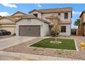 Charming two-story home featuring a low maintenance yard with a large driveway at 342 E Backman St, San Tan Valley, AZ 85140