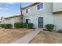 Charming two-story townhouse with landscaped front yard and inviting entrance at 4703 N 26Th Ln, Phoenix, AZ 85017