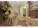 Spacious foyer with tiled floors and tasteful decor at 4820 N 210Th Ave, Buckeye, AZ 85396