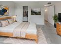 Serene bedroom with natural light, comfortable furnishings, and a minimalist aesthetic at 5432 E Juniper Ave, Scottsdale, AZ 85254