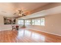 Bright bonus room with hardwood floors and multiple windows at 9402 N 109Th Dr, Sun City, AZ 85351