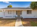 Inviting front entrance featuring a covered porch and a neutral-colored front door at 1743 N Dresden --, Mesa, AZ 85203