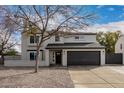 Charming two-story home with a well-manicured yard and a spacious two-car garage at 19409 N 45Th Dr, Glendale, AZ 85308