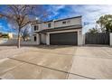 Two-story home boasts well-manicured gravel yard and a spacious driveway, providing ample parking at 19409 N 45Th Dr, Glendale, AZ 85308