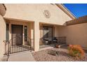 Cozy front porch area with desert landscaping, perfect for enjoying the outdoors at 2101 S Meridian Rd # 176, Apache Junction, AZ 85120