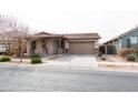 Inviting single-story home with desert landscaping, showcasing a clean and attractive facade at 22465 E Via Del Verde --, Queen Creek, AZ 85142