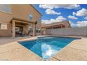 Backyard pool featuring a patio area, tall fence, and basketball hoop for outdoor entertainment at 32 W Desert Vista Trl, San Tan Valley, AZ 85143