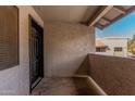 An outside balcony featuring a unit door showing the view at 234 N 75Th St # 209, Mesa, AZ 85207