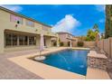 Inviting backyard pool with ample patio space perfect for relaxing and entertaining outdoors at 2873 E Nolan Pl, Chandler, AZ 85249