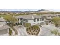 Aerial view of the property showcasing desert landscaping and multiple garages at 33575 N Dove Lakes Dr # 2036, Cave Creek, AZ 85331