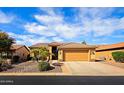 Beautiful home with a tile roof, well-kept front yard, and two-car garage in a desirable neighborhood at 3768 N 162Nd Ln, Goodyear, AZ 85395