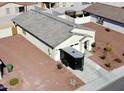 Well-kept home with an attached garage and tidy desert landscaping at 1418 E Peggy Dr, Casa Grande, AZ 85122