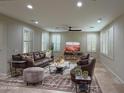 Cozy living room with comfortable seating, stylish decor, and ample natural light, ideal for relaxation at 18515 N 94Th St, Scottsdale, AZ 85255